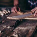 Do You Use Vacuum Press Woodworking Image of a craftsman using a vacuum press woodworking machine to create precise and seamless woodwork