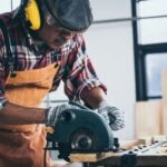 Greige paint paired with brown woodwork creates a warm and sophisticated color scheme