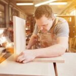 Sawdust-filled workshop showcasing profitable woodworking projects and tips on how to make money