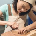 Why Does My Cat Lick Woodwork Curious cat investigating woodwork, wondering why it loves licking it