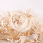 Alt text suggestion: Illustration of original woodworkers creating various wooden objects using their craftsmanship skills