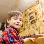 A 40-Year-Old Male Was in His Woodworking A 40-year-old male, wearing protective gear, crafting woodwork with precision and expertise