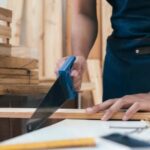 A wooden dog bed designed and handcrafted by a skilled woodworker