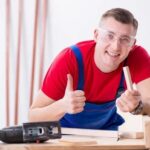 Is It Woodworking or Wood Working Close-up of intricate wood carving in progress—Is it woodworking or wood working?