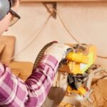 A chilled glass of beer sitting on the workbench at Garage Beers Woodworking