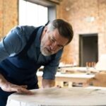 Diverse individuals with varying skills and interests crafting wood products