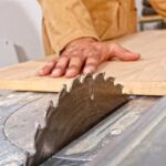 Image of a crosscut in woodworking, showing the process of cutting across the grain