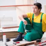 Why Do Golden Retrievers Chewing on Woodwork Golden Retriever puppy chewing on woodwork, practicing natural instincts and exploring textures