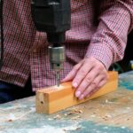 Image showcasing a person working on woodworking projects with a caption: Can you make a living woodworking?