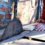 Clamps used for securing wood pieces together during woodworking projects for stability and precision