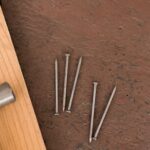 How Do Woodworkers Bend Wood on Yachts Woodworker bending yacht wood with heat and steam for curved design