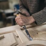 Craftsman crafting joints for woodworking projects