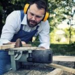Cozy woodwork bedroom with rustic furniture and warm lighting
