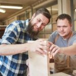 A 40 Year Old Male Was in His Woodworking Shop A 40-year-old male craftsman in his woodworking shop creating handmade furniture