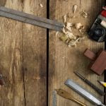 What to Wear for Woodworking protective eyewear, durable gloves, comfortable work boots, and appropriate clothing